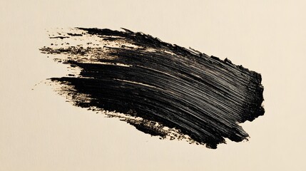 Black Mascara Brush Stroke on Light Background.