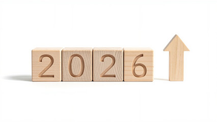 Wooden blocks with 2026 and arrow up.
