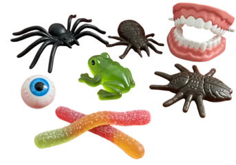 Halloween candy and decorations in assorted shapes and colors transparent background