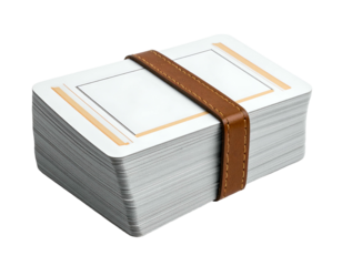 Stacked white cards, bound by a leather strap, on black