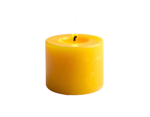Yellow wax candle with a bright flame