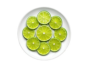 Lime slices arranged on white plate, overhead shot