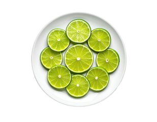 Lime slices arranged on white plate, overhead shot