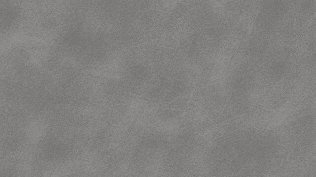 Detailed close up macro shot reveals the subtle texture and natural grain of a uniform dark grey suede leather surface background.