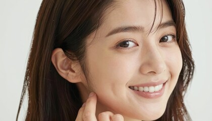 Portrait of a Cheerful Woman Smiling with Natural Beauty and a Joyful Expression in Soft Lighting