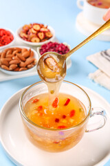 Healthy Nuts and Goji Berry Soup with Golden Broth