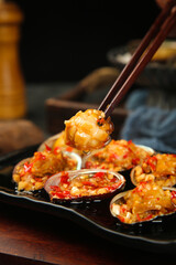 Steamed Abalone with Garlic Sauce and Chopsticks