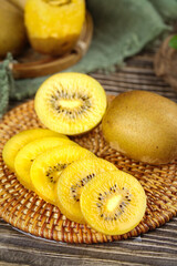 Fresh Golden Kiwifruit Still Life with Rustic Wood Background