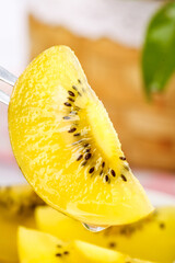 Fresh Golden Yellow Kiwi Slice with Black Seeds - Still Life