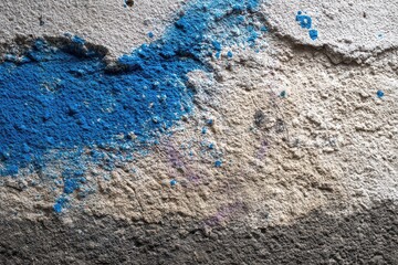Macro Shot of Textured Wall Covered with Silver Paint and Blue Powder Paint Texture in Dim Lighting