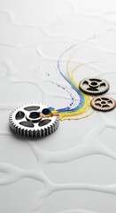 Gears and colorful paint splashes on a white background, representing creativity and innovation in mechanical processes.