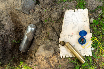 A time capsule in the ground.Find a pirate treasure with a child.A treasure map on a quest.