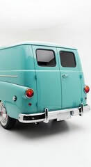 Classic turquoise delivery van isolated against a bright white backdrop