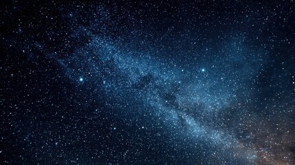 Milky Way Galaxy Sparkles with Countless Stars in Night Sky and Dark Blue Backdrop