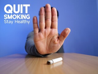 Stop Smoking - Hand Blocking Cigarette on Table