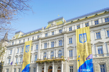 Fototapeta premium Lviv Classical Architecture with Ukrainian Flags, Ukraine