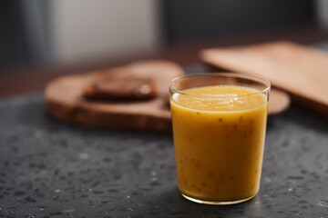Fresh mango lulo smoothie on kitchen countertop