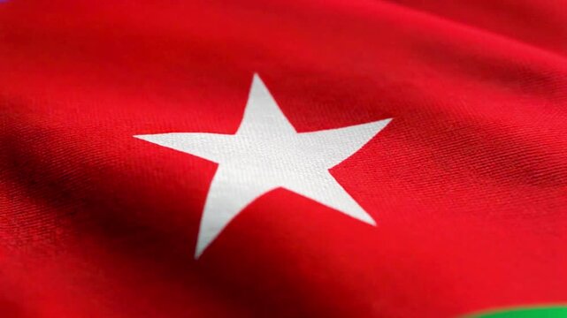 Extreme close-up of the white seven-pointed star on the red triangle of the Jordanian national flag, cinematic 4K macro.