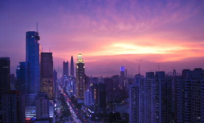 Obraz premium Shenzhen Skyline at Night with Purple Sunset Sky