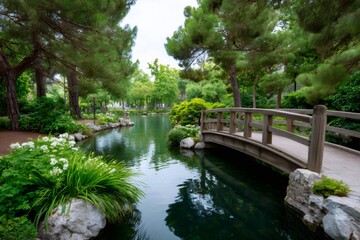 Japanese garden wooden bridge crossing tranquil pond