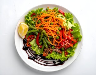 Colorful salad with various vegetables, sauce, and lemon wedge