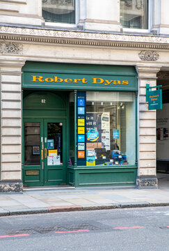 London, UK - March, 24, 2024 - The Robert Dyas storefront in London , the exterior of the traditional ironmonger shop on a busy city street.