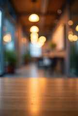 Warm illuminated wooden table surface with a soft bokeh background of an inviting indoor space
