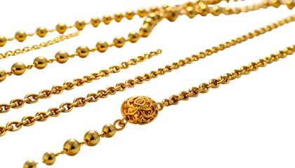 Close-up of multiple gold chains, featuring varying links and bead details on a black backdrop