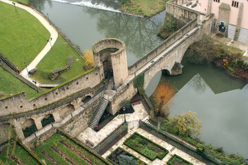 Luxembourg - The aerial view of Stierchen Bridge (Pont du Stierchen), medieval stone arch footbridge, and Alzette River in the Grund quarter of oild town of capital