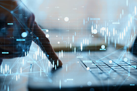 Businessman's finger pressing laptop keyboard with financial trading charts and analytics data overlay on blurred office background concept. - Powered by Adobe