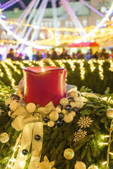Szeged, Hungary, Giant christmas market at next to Szeged cathedral. Hungarian foods, drinks, presents and gifts. Giant labirintyh and ferris whhel for children