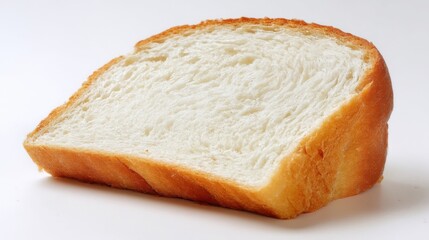 A transparent bubble filled with white liquid rests inside a glass container,