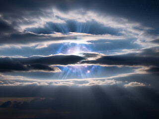 Obraz premium A dramatic sky with dark clouds parting to reveal a glowing, ethereal blue light source with powerful rays shining through.