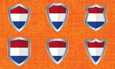 Set of metal shields with the Dutch flag