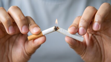 Breaking a lit cigarette - Quit smoking concept