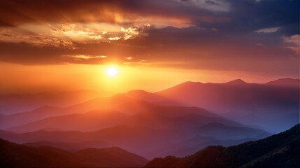 Obraz premium Sunset over rolling mountains with colorful sky and clouds in the background during evening