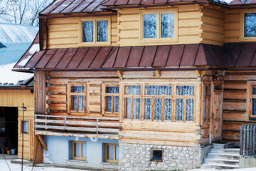 CHOCHOLOW, POLAND - DECEMBER 26, 2025: Wooden architecture of Chocholow, willage near the Zakopane, Poland.