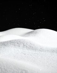 Pristine White Snow Drifts Against a Dark Night Sky with Falling Flakes.