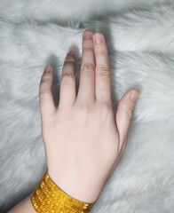 Natural female hand with clean nails on white background