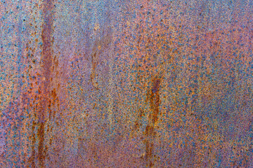 Rusty Corroded Metal Surface with Orange and Blue Tones