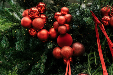 Festive Christmas Tree Decorated with Red Baubles and Ribbons