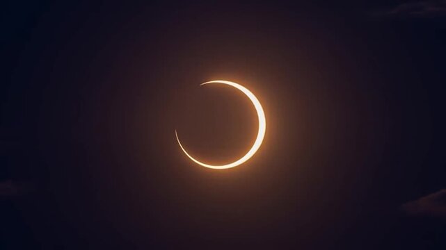 Solar eclipse with moon passing in front of sun
