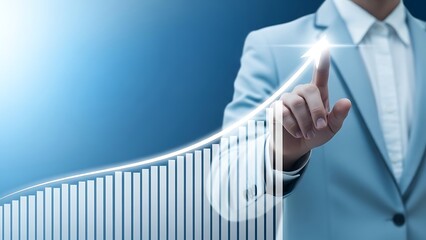 Person pointing to upward trending financial graph