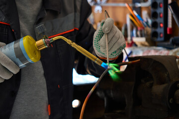 soldering copper pipes with a gas torch