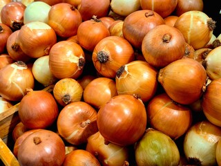 Fresh Brown Onions Pile at the Market