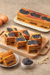 Lapis legit is a multi-layered Indonesian cake inherited from the Dutch colonial era, often served...