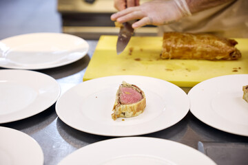 hand holding a plate with food