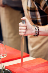 close up of a woman holding a cup of tea