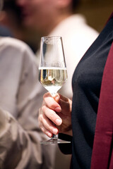 man holding a glass of champagne