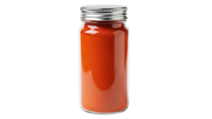 Isolated glass jar filled with bright orange powder for a product shot in the food sector